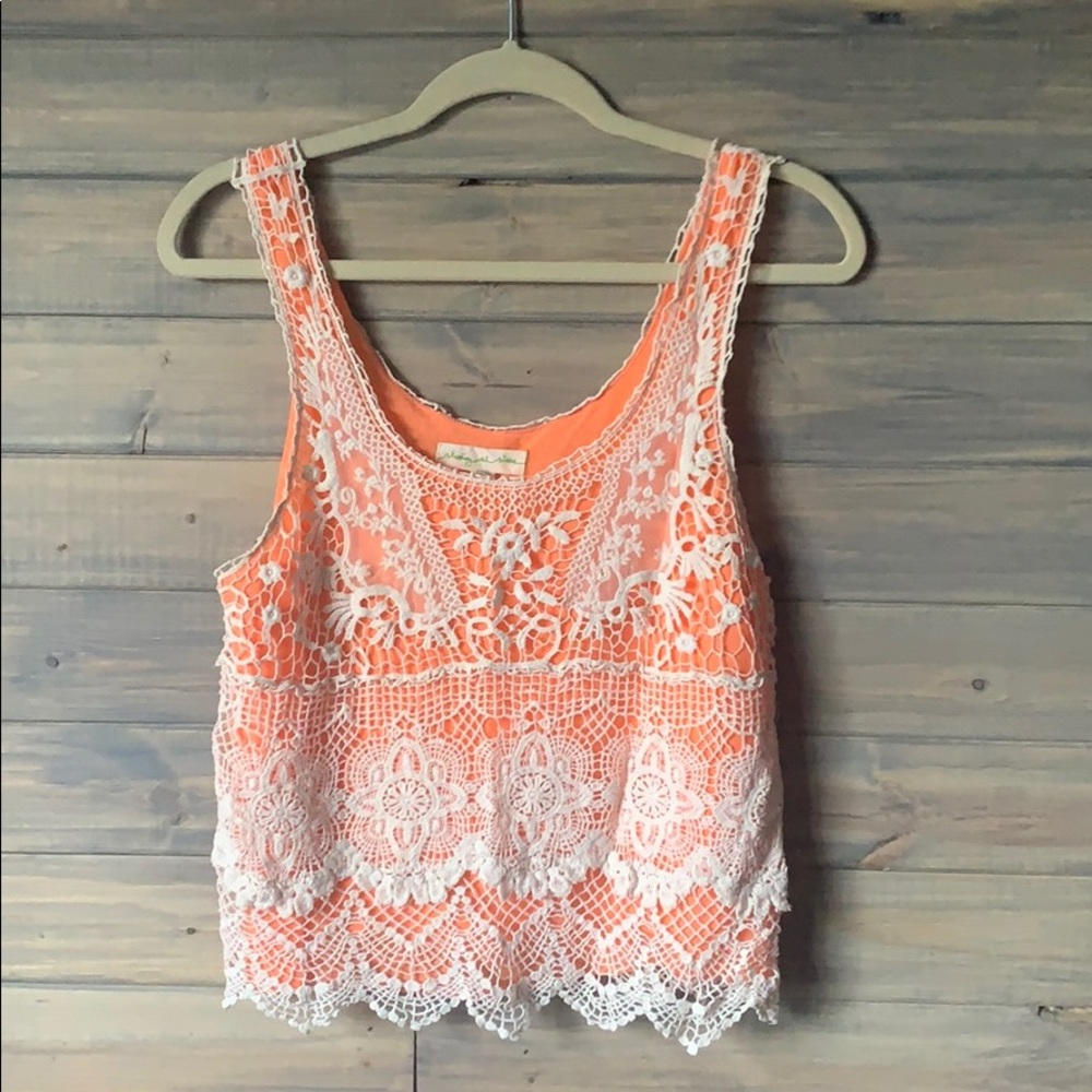 Orange crop top with lace overlay